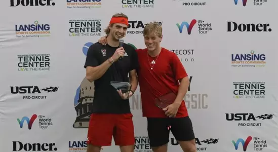 Robin Catry and Fons Van Sambeek accepting ITF M15 Pro award