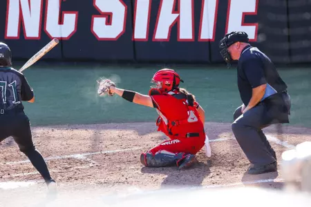 Hasler behind the plate