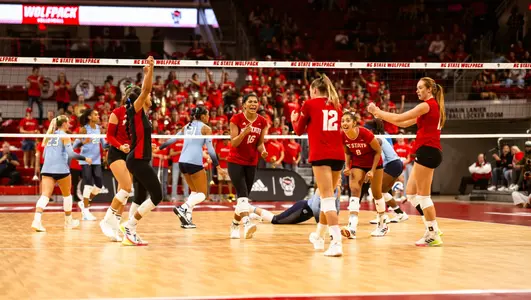 Vollyball celebrating a point against UNC 10/11/24
