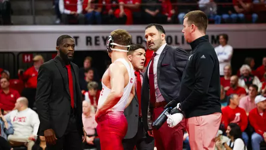 Alex Faison with Coaches (2/2/24)