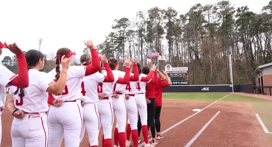 Team during the national anthem - GT DH March 8, 2024