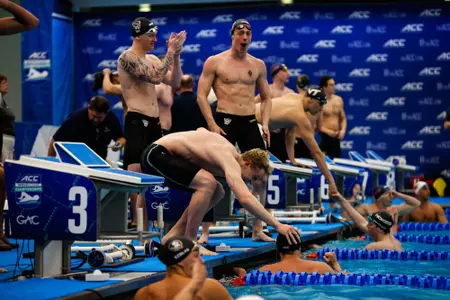 Mens swimming celebration
