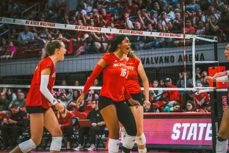 Jada Allen celebrates a Wolfpack point vs Louisville