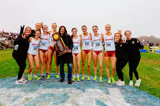 XC Women With NCAA Championship Trophy