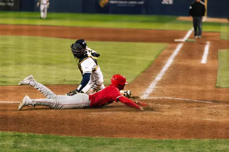 Ty Head sliding into home