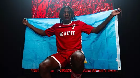 MSOC2025 Donavan Phillip with Saint Lucia flag