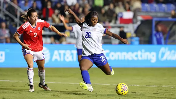 SANTA BARBARA, CALIFORNIA - JANUARY 27: Jameese Joseph #26 of United States of America shoots and scores a goal against Fernanda Ramirez #3 of Chile during the first half of an international friendly soccer match at Harder Stadium on January 27, 2026 in Santa Barbara, California. (Photo by Kevork Djansezian/Getty Images)