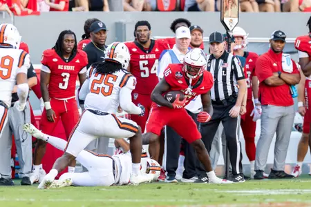 Photos from the second half of the non-conference football game between the Coastal Athletic Association (CAA) Campbell Fighting Camels and the Atlantic Coast Conference (ACC) NC State Wolfpack on October 4th, 2025 at Carter-Finley Stadium in Raleigh, NC. The Wolfpack defeated the Fighting Camels 56:10.