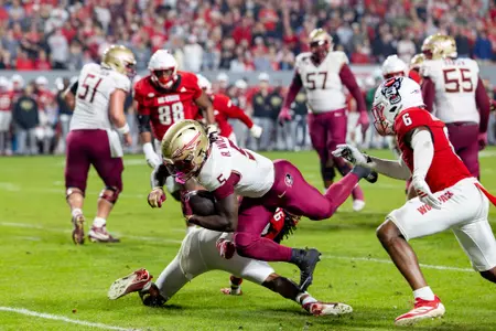 Florida State Seminoles running back ROYDELL WILLIAMS (5) runs the ball during the first half of the NCAA football game between the Florida State Seminoles and the NC State Wolfpack on November 21st, 2025 at Carter-Finley Stadium in Raleigh, NC.