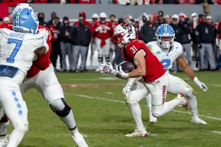NC State Wolfpack running back COLESON FIELDS (31) runs the ball during the second half of the NCAA football game between the North Carolina Tar Heels and the NC State Wolfpack on November 29th, 2025 at Carter-Finley Stadium in Raleigh, NC.