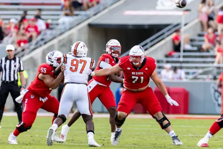 Photos from the second half of the non-conference football game between the Coastal Athletic Association (CAA) Campbell Fighting Camels and the Atlantic Coast Conference (ACC) NC State Wolfpack on October 4th, 2025 at Carter-Finley Stadium in Raleigh, NC. The Wolfpack defeated the Fighting Camels 56:10.