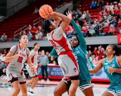 zoe brooks shoots a basket vs. uncw