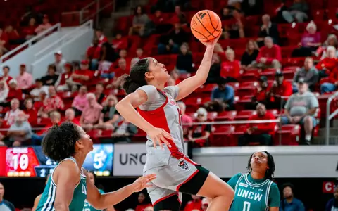 Khamil Pierre drives to the hoop for a layup