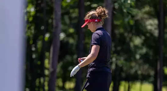 Marie Madsen lines up for drive shot at NCAA Chapel Hill Regional
