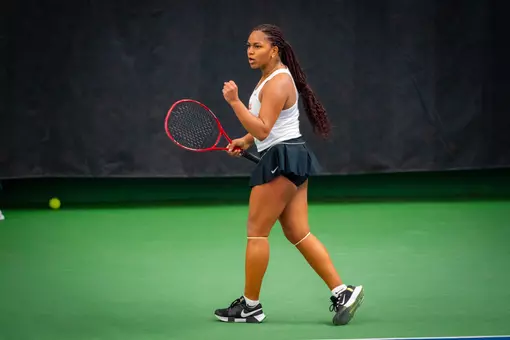 Ariana Anazagasty-Pursoo celebrates after a point on the tennis court