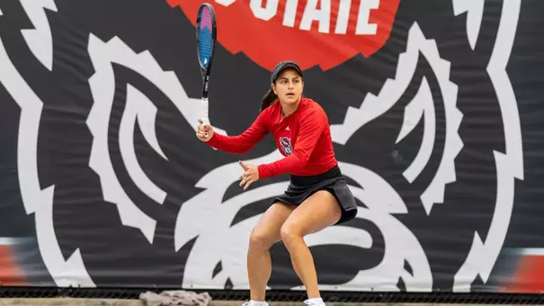 Lavinia Tanasie playing in women's tennis' match against UCF
