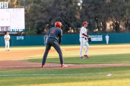Sherman Johnson leading off third base