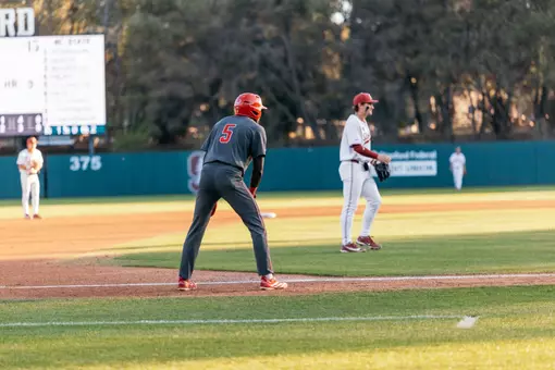 Sherman Johnson leading off third base