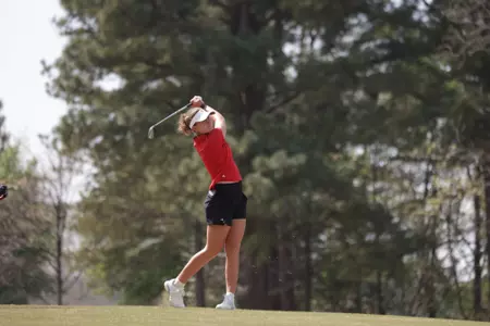 Marie Madsen Swings at the City of Oaks Collegiate