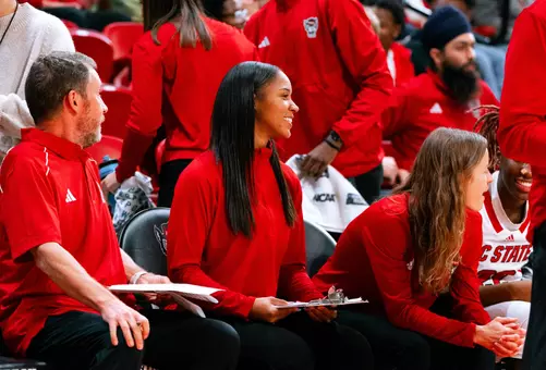 Brittany Morris coaches from sidelines during the 2023-24 season for NC State women's basketball