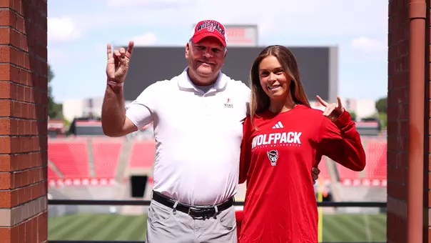 Kate and Tim Kilpatrick pose for a photo at Carter-Finley Stadium in May 2026