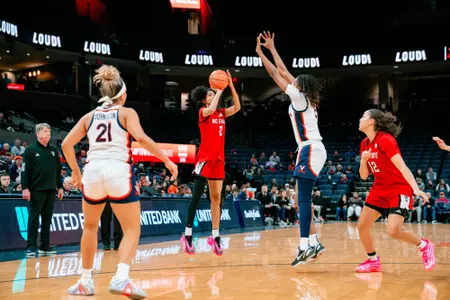 Qadence Samuels of the NC State women's basketball team shoots a 3-pointer vs. Virginia on Jan. 24