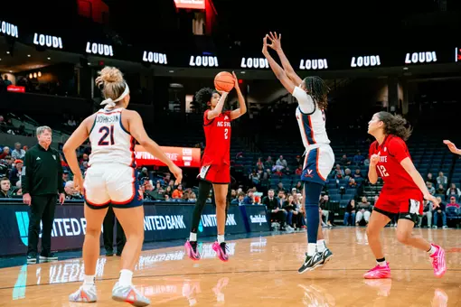 Qadence Samuels of the NC State women's basketball team shoots a 3-pointer vs. Virginia on Jan. 24