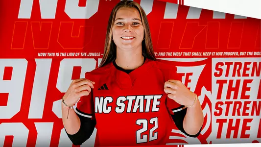 Elle McCloskey poses in front of the custom backdrop - June 2026