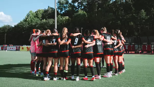 NC State Women's Soccer Team Huddle