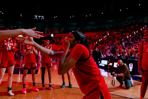 Destiny "Ky'She" Lunan does the scuba during introductions prior to NC State vs. Michigan in the NCAA Tournament