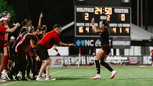Erica Roberts and Gary Higgins Celebrate vs. Elon