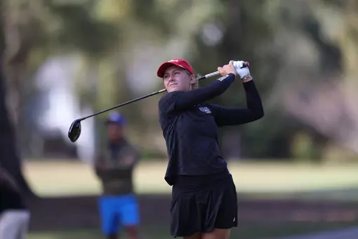 Marie Madsen swings at the Landfall Tradition