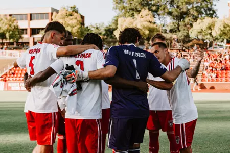 Group huddle vs. UNCW (Sept. 15, 2026)