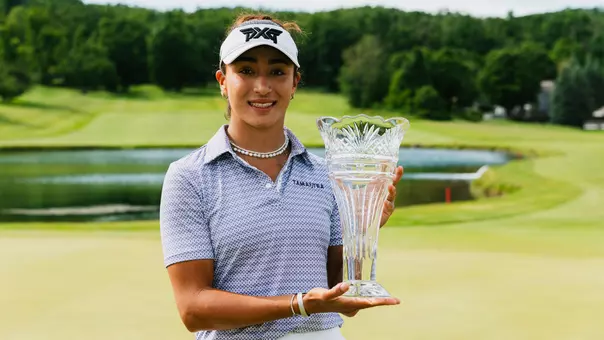 Lauren Olivares poses with her trophy after her first career win on the Epson Tour