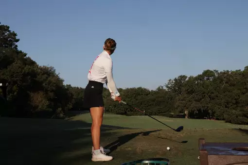 Marie Madsen tees off at the Cougar Classic