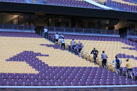 The rowing team ran the stairs at TCF Bank Stadium Friday night.