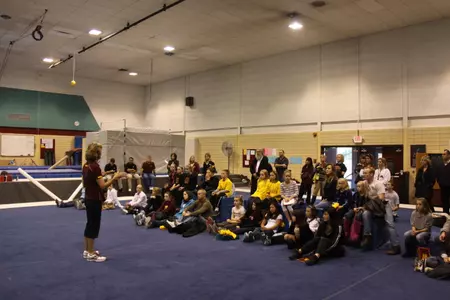 Head Coach Meg Stephenson talking with the fans.