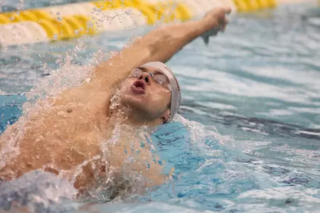David Plummer returns from China with a gold medal.