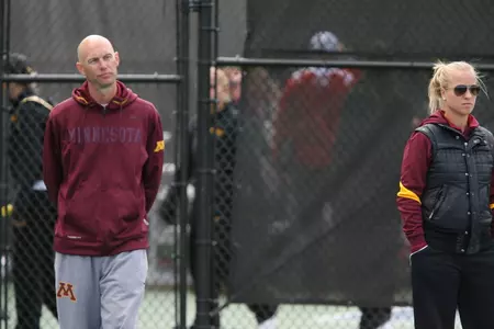 Coach Tyler Thomson watches his players compete in the Gopher Invitational.
