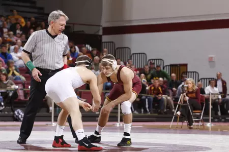Dylan Ness pinned Cole Schmitt in the first period to lead Minnesota to a 37-3 Border Battle win over Wisconsin