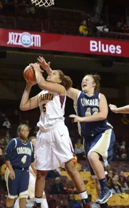 Kionna Kellogg shows off the new uniforms in the Gopher's exhibition game