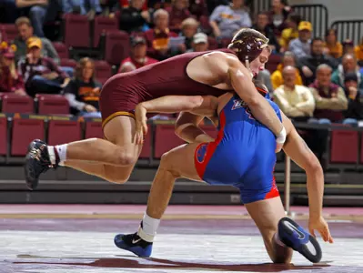 Logan Storley opened the dual with a 10-1 major decision over Scott Bacon, igniting momentum for the Gophers.