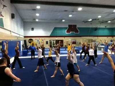 Seniors Janell Campbell and Shannon Golich leading the warmup session.