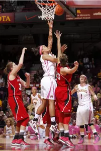 Kionna Kellogg reaches for a rebound. Kellogg registered 11 rebounds and six points.