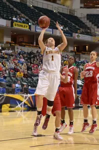 Rachel Banham drives to the basket for a layup.