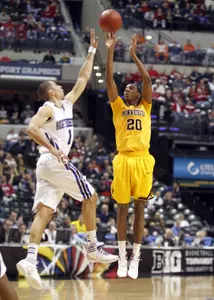 Austin Hollins scored 12 points, grabbed seven rebounds and finished with six assists against Northwestern.