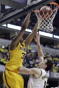 Rodney Williams scored 20 points in the OT loss to Michigan.