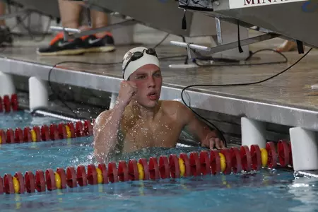 CJ Smith beat a 25 year pool record against Wisconsin in the 1650 yard freestyle (15:33.35)