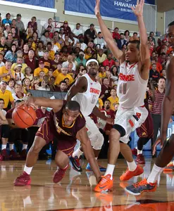 Andre Hollins scored 14 points in the Maui Invite opener against Syracuse.