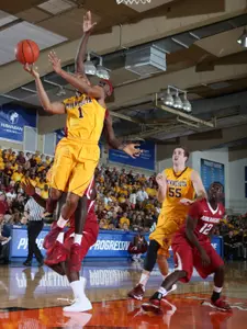 Austin Hollins goes up for a shot.